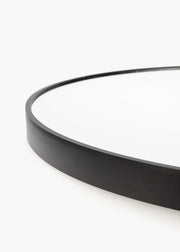 Close-up of Satin Horizon Arch Mirror matte black aluminum frame with smooth jointless design