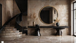 Solaro Round Mirror with brushed gold aluminum frame in a modern luxurious interior setting