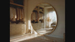 Solaro Round Mirror with Brushed Gold Frame.