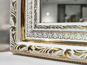 Ivory Majesty Mirror featuring an ornate white frame, elegant wall decor enhancing classic interior aesthetics