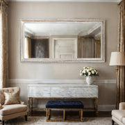 Ivory Majesty Mirror featuring an ornate white frame, elegant wall decor enhancing classic interior aesthetics